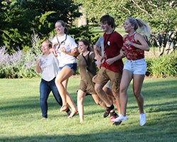 Teens participating in a team building exercise